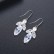 Light leaf winter sweet Korean copper inlaid zircon earrings, personalized fashion pearl female earrings factory wholesale