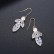 Light leaf winter sweet Korean copper inlaid zircon earrings, personalized fashion pearl female earrings factory wholesale