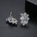 Qianye new European and American fashion copper inlaid zircon earrings women's sweet earrings factory wholesale