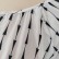 New black and white fashion geometric loose short-sleeved butterfly tassel lace-up women's blouse