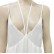 New white V-neck, low-cut, bifurcated hem, cross-strap dress on the back