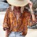 Spring and summer ruffled long-sleeved new European and American print loose and versatile fashion single-breasted top