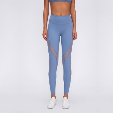 Spring and summer new stitching mesh grinding yoga pants high waist hip quick dry breathable sports nine pants female Europe