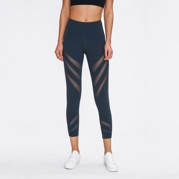 New striped hollow mesh yarn naked yoga pants solid color stretch slim running sports seven pants female spring and summer