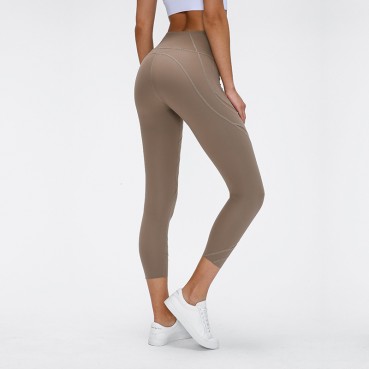 New striped hollow mesh yarn naked yoga pants solid color stretch slim running sports seven pants female spring and summer