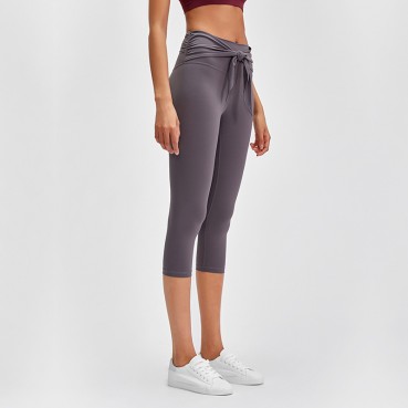 New front waist fashion straps sports seven pants women's skinny naked stretch Slim high elastic yoga pants Europe and the United States