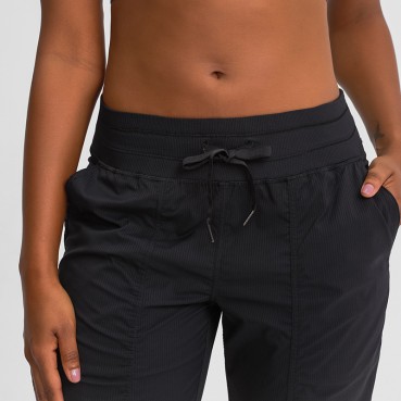 INS new woven pocket yoga pants loose bundles foot trousers speed dry tight sports casual pants female autumn and winter