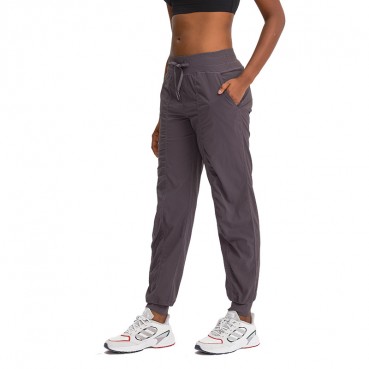 INS new woven pocket yoga pants loose bundles foot trousers speed dry tight sports casual pants female autumn and winter