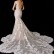 Exquisite and dreamy classic Spanish bridal wedding dress with soft floral embroidered lace