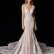 Exquisite and dreamy classic Spanish bridal wedding dress with soft floral embroidered lace