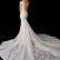 Stunning floral embroidered lace tail wedding dress