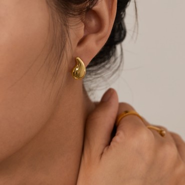 Jewelry factory fashion, simple personality niche stainless steel geometric light surface water droplet design sensor earrings